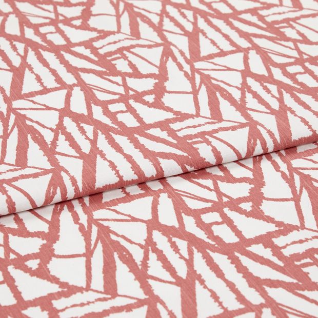 A folded piece of fabric with Alder Red printed on it