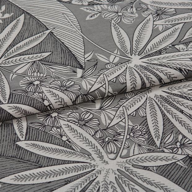 A folded piece of fabric with Diva Charcoal Grey printed on it