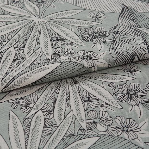 A folded piece of fabric with Diva Mineral Grey printed on it