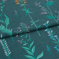 A folded piece of fabric with Botanical Bayberry Green printed on it