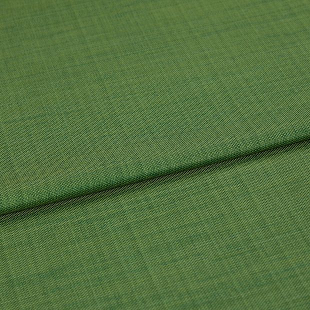A folded piece of fabric with Clarence Evergreen Green printed on it