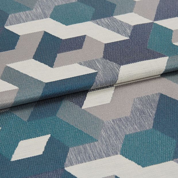 A folded piece of fabric with Connect Pacific Teal printed on it