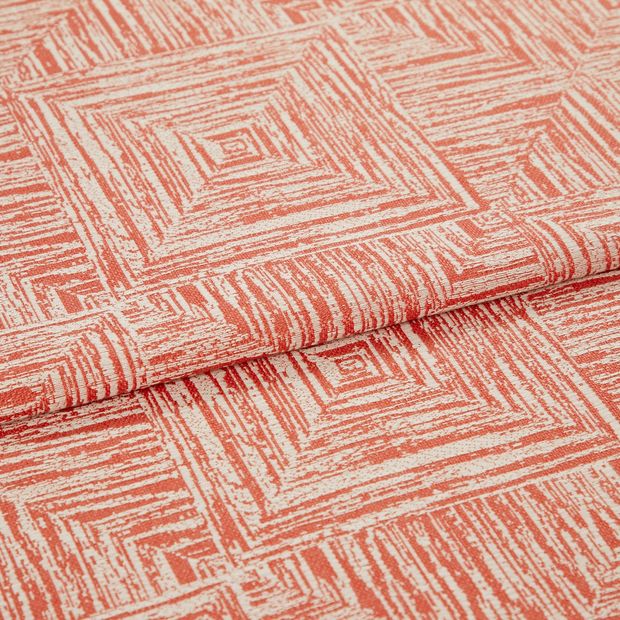 A folded piece of fabric with Gilmore Fiesta Red printed on it