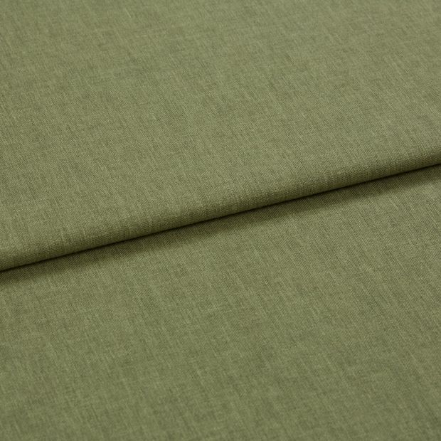 A folded piece of fabric with Harper Dill Green printed on it