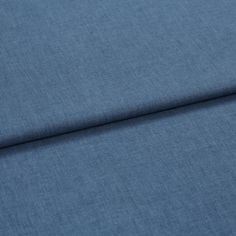 A folded piece of fabric with Harper Navy printed on it