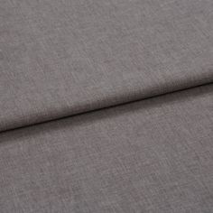 A folded piece of fabric with Harper Twilight Grey printed on it
