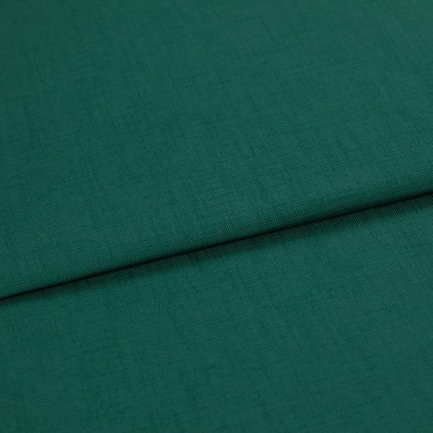 A folded piece of fabric with Faso Lake Teal printed on it