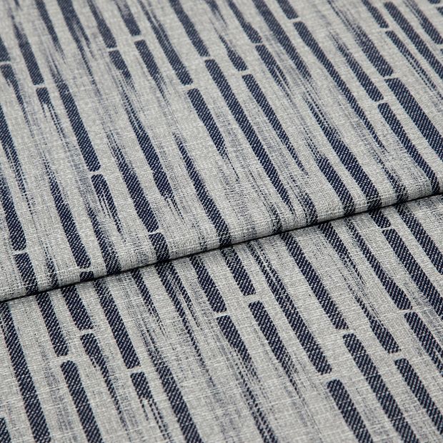 A folded piece of fabric with Flourish Nightshadow Navy printed on it
