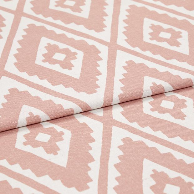 A folded piece of fabric with Mali Coral Pink printed on it