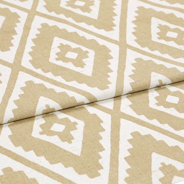 A folded piece of fabric with Mali Sauterne Yellow printed on it
