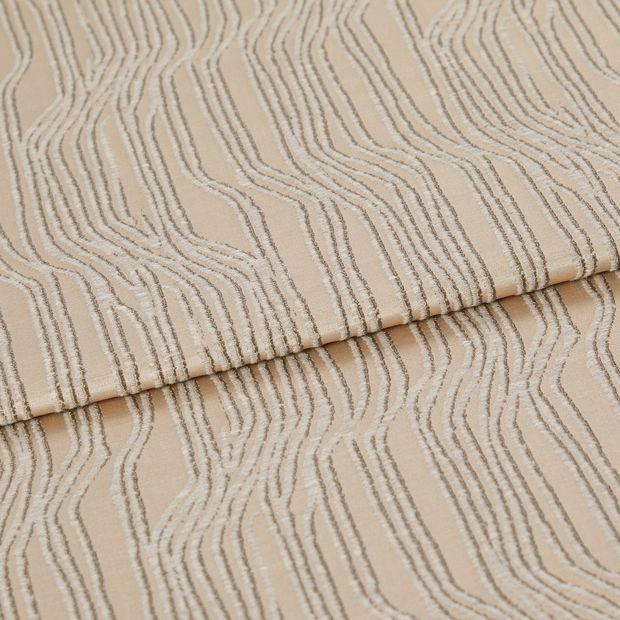 A folded piece of fabric with Maud Shell Brown printed on it