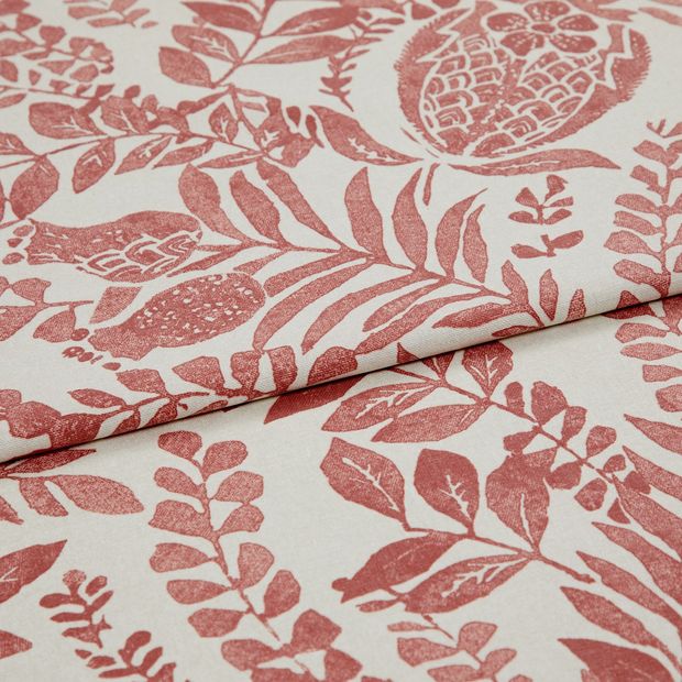 A folded piece of fabric with Morris Beet Red printed on it