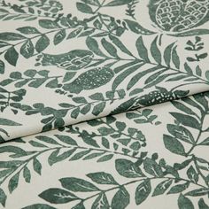 A folded piece of fabric with Morris Mallard Green printed on it