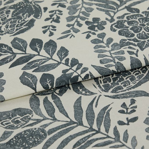A folded piece of fabric with Morris Navy Blue printed on it