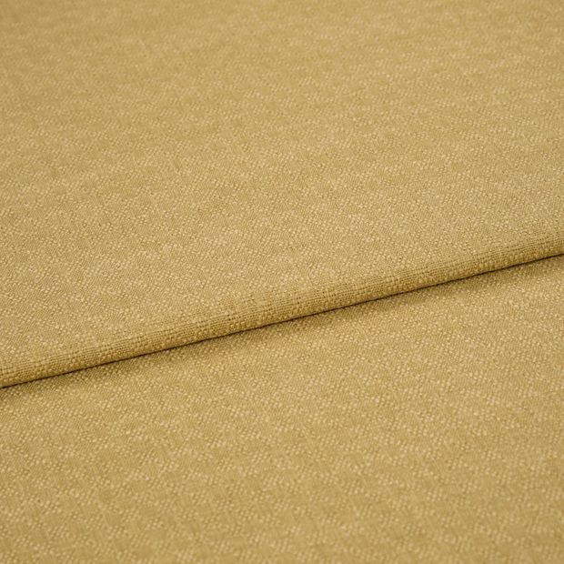 A folded piece of fabric with Pearl Wheat Gold printed on it
