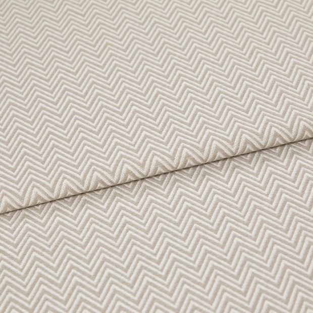 A folded piece of fabric with Pippa Natural Cream printed on it
