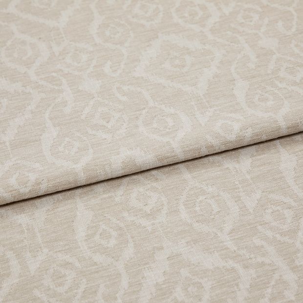 A folded piece of fabric with Prisha Linen Cream printed on it