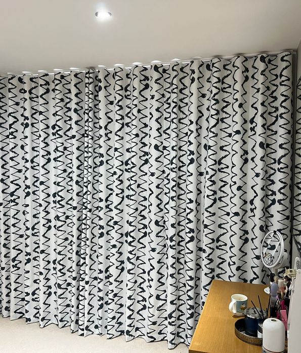 Wolfe smoulder floor length curtains in bedroom