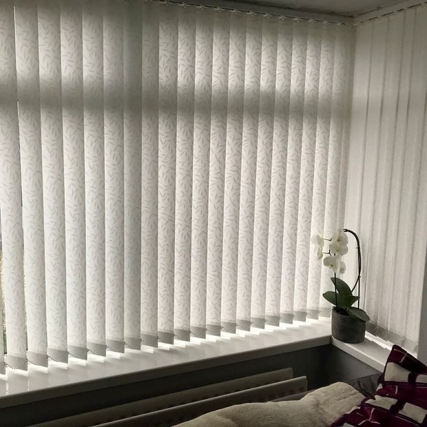 Penang white vertical blinds in box window in bedroom