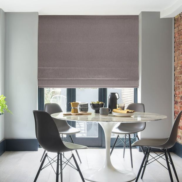 Solar berry textured roman blind in dining room