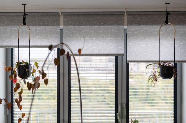Three atlas marine electric roller blinds in apartment