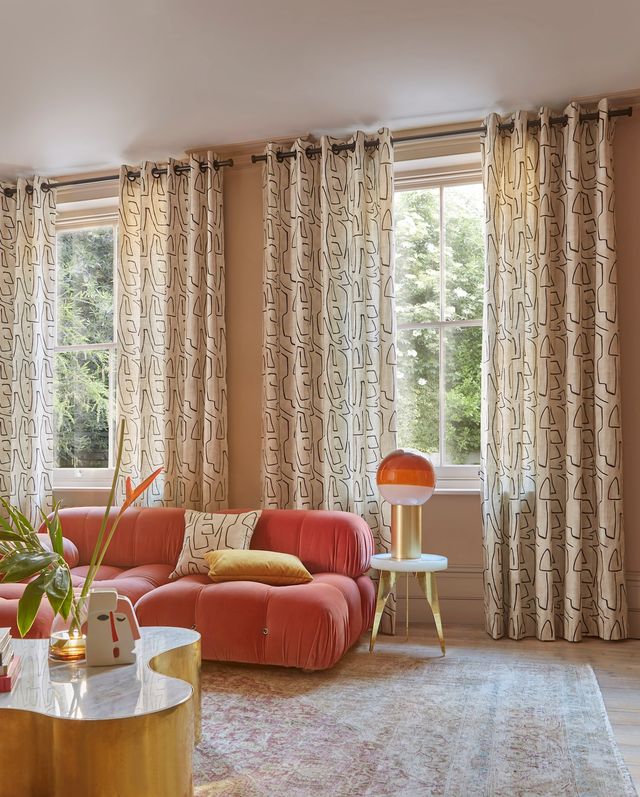 Nora putty floor length eyelet curtains in cosy pink themed living room
