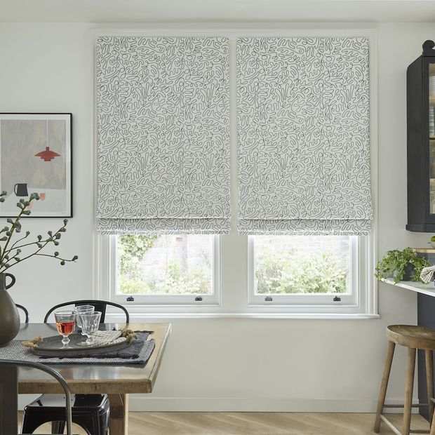 Matisse monochrome roman blinds in rustic kitchen/dining area