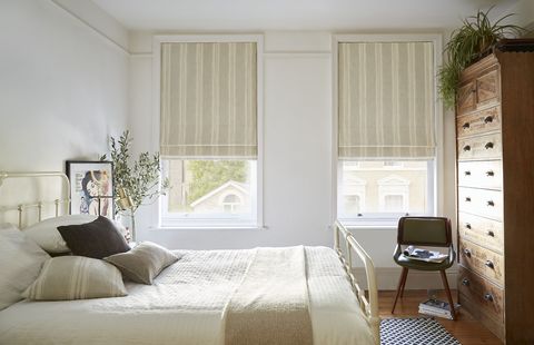Duke olive striped roman blinds in light cream bedroom