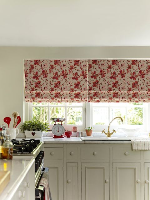 Forenza berry floral roman blinds in cream coloured kitchen