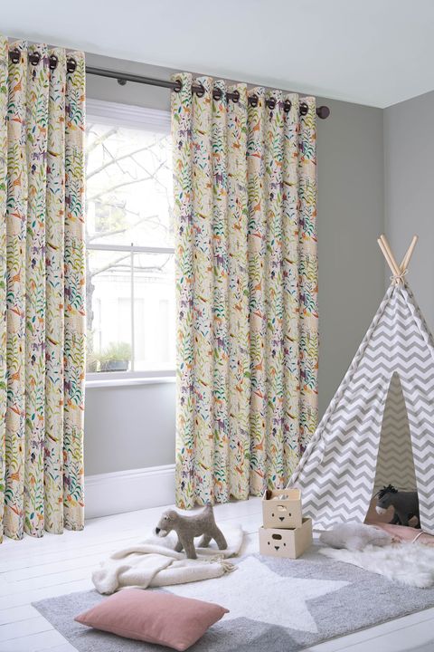Hide & Seek Jungle floor length eyelet curtains in children's bedroom