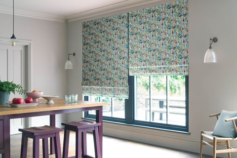 Emelina waterfall roman blinds in dining room