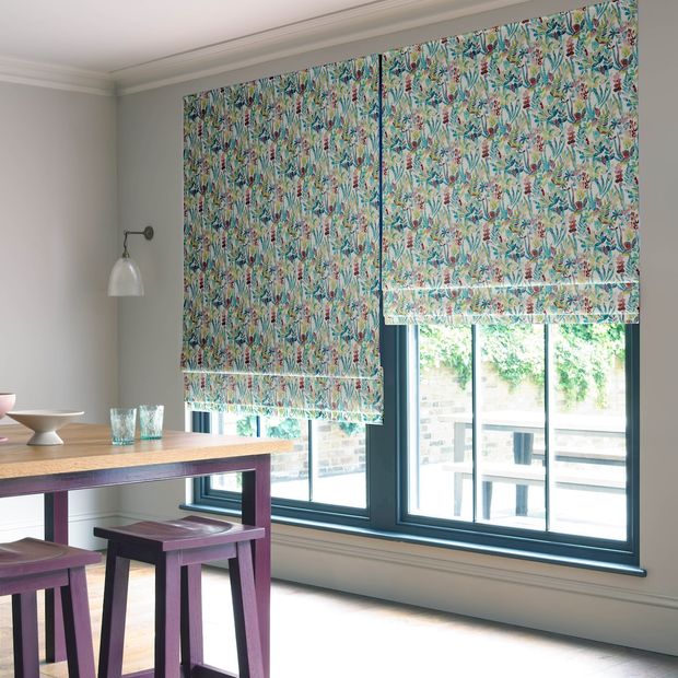 Emelina waterfall roman blinds in dining room