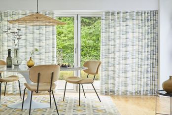 Mist slate wave curtains in open plan dining area