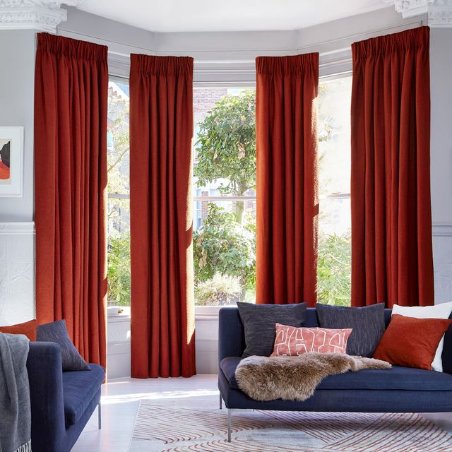 soho boucle spice floor length curtains in bay window in living room