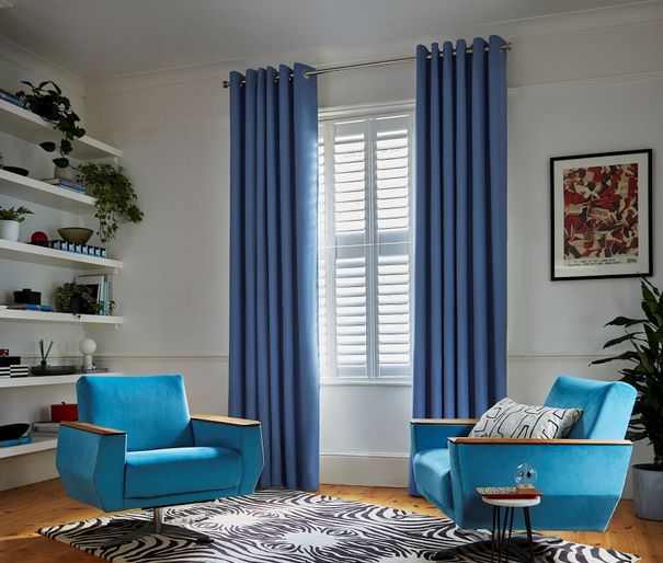 blue faso cornflower floor length eyelet curtains in living room