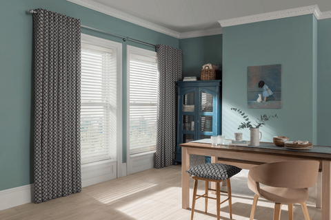 eclipse denim floor length eyelet curtains paired with venetian blinds in dining room