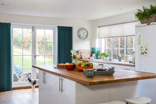 boheme teal floor length kitchen curtains paired with blanca taupe roller blind