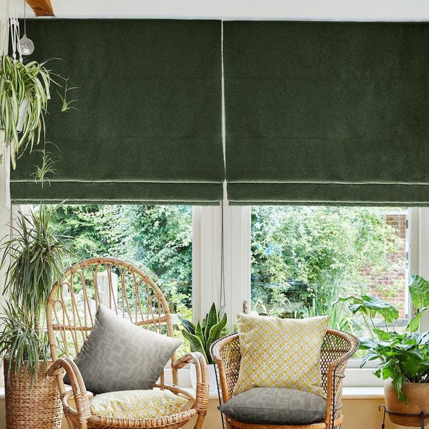 soho boucle forest roman blinds in green living room