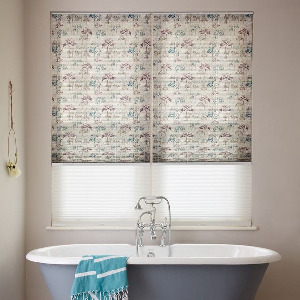 aquarelle grey pleated blinds paired with sheer white pleated blinds in bathroom