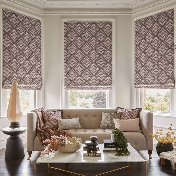harkness vapour roman blinds on bay window in contemporary living room