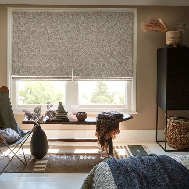 pair of nola camo roman blinds in rustic living space