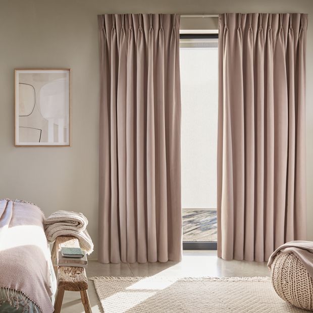 Serene mauve floor length pinch pleat curtains in bedroom
