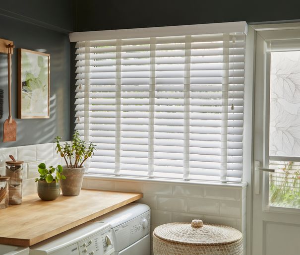 Mirage faux wood pinnacle white venetian blinds with white tape in utility room