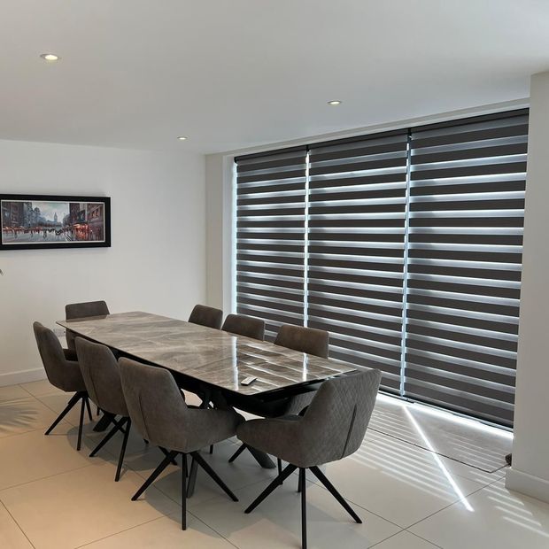 dusk black dimout day and night blinds in open space dining room