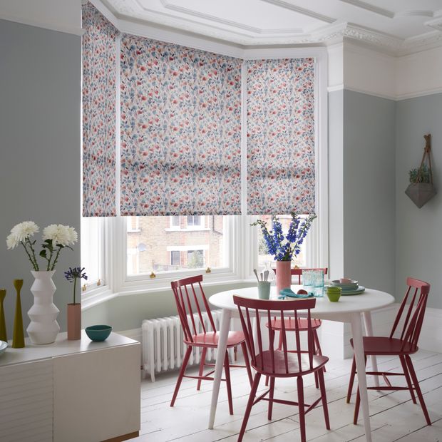 Grace lavender roller blinds on bay window in dining area