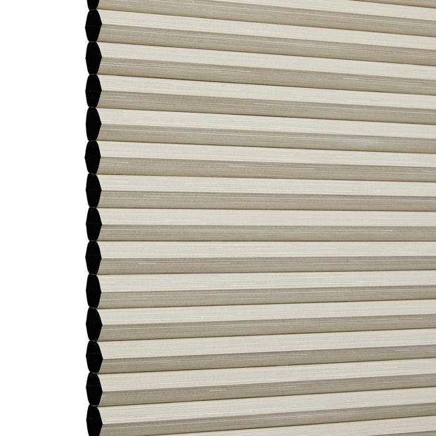 Oat Thermashade swatch is a darker cream shade - image has an angle view, showing the side of the pleated blind