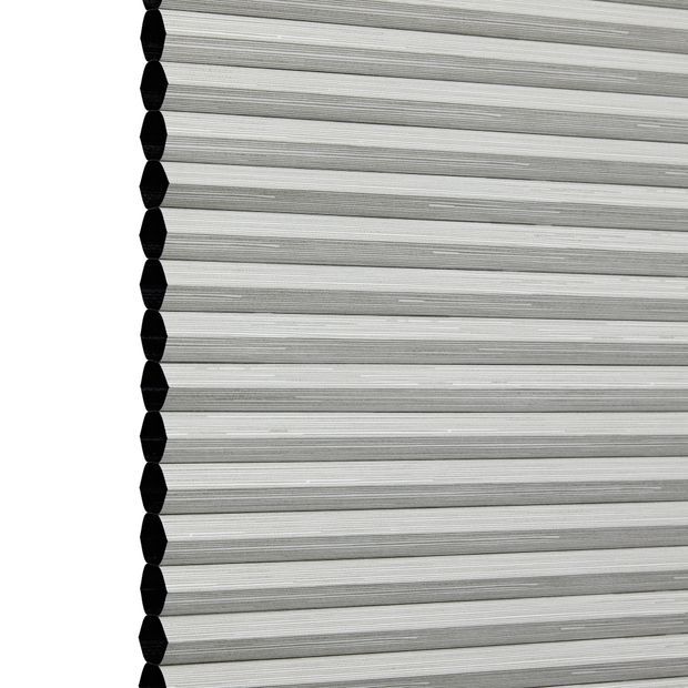 Ash Thermashade swatch is a mid grey shade- image has an angle view, showing the side of the pleated blind