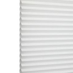 Alabaster Duette swatch is a plain white shade- image has an angle view, showing the side of the pleated blind