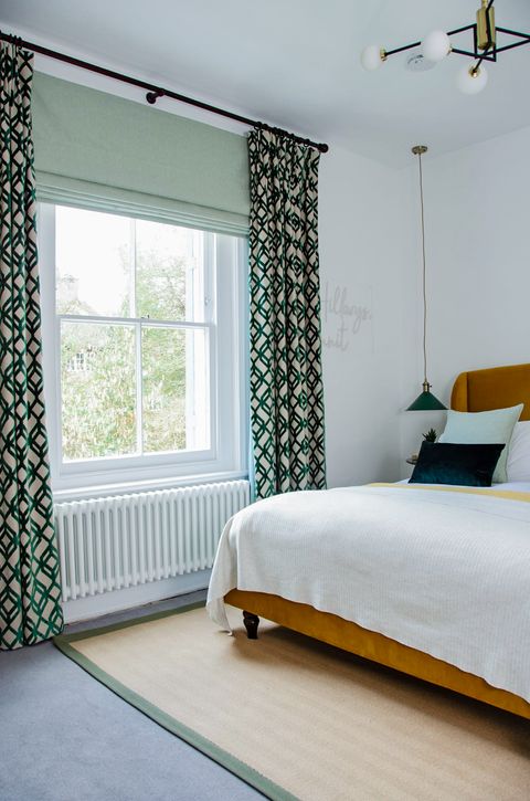 kendra sage roman blinds paired with loxly emerald curtains in teenagers bedroom