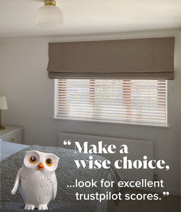 beige roman blind paired with white venetian blinds on bedroom window withy window wise overlay